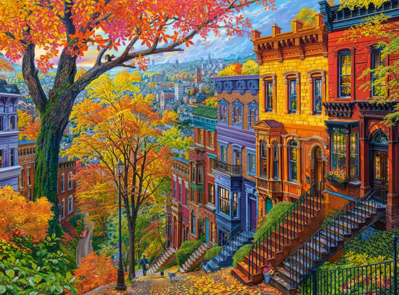 Herbstliche Stadt auf dem Hügel